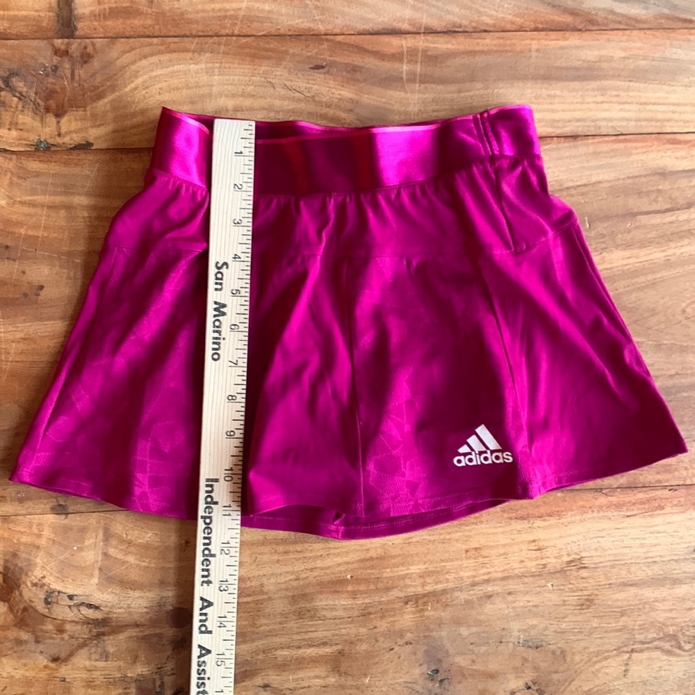 Magenta XS Adidas tennis skirt with panels for a subtle flounce